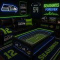 Seattle Seahawks NFL coffee table with lit stadium top in a dark man-cave